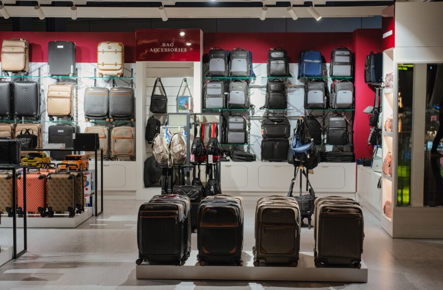 Elegant luggage display in a premium Doha airport shop, Qatar.