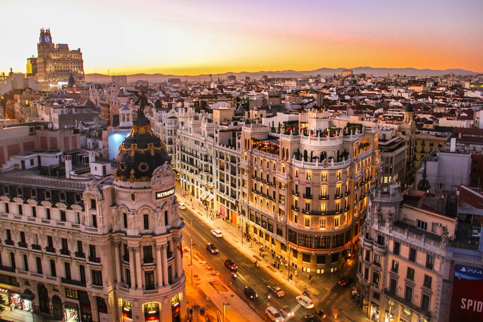 An aerial view of the Metropolis building and Gran Via in Madrid at low sun